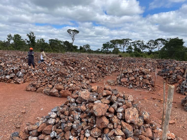 Manganese ore stacked in the open, sorted by grade