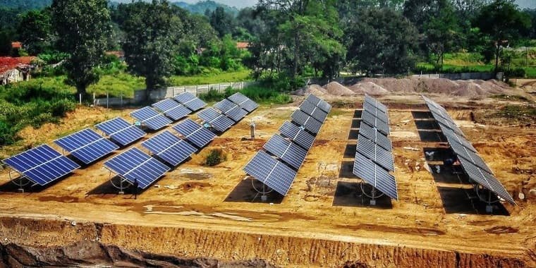 Rows of solar panels laid out on worked-out mine ground
